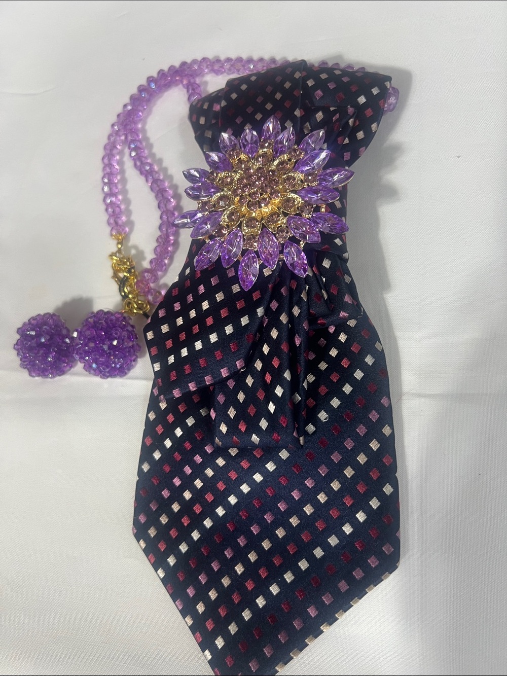 Navy Diamond Pattern Necktie with Purple Crystal Brooch